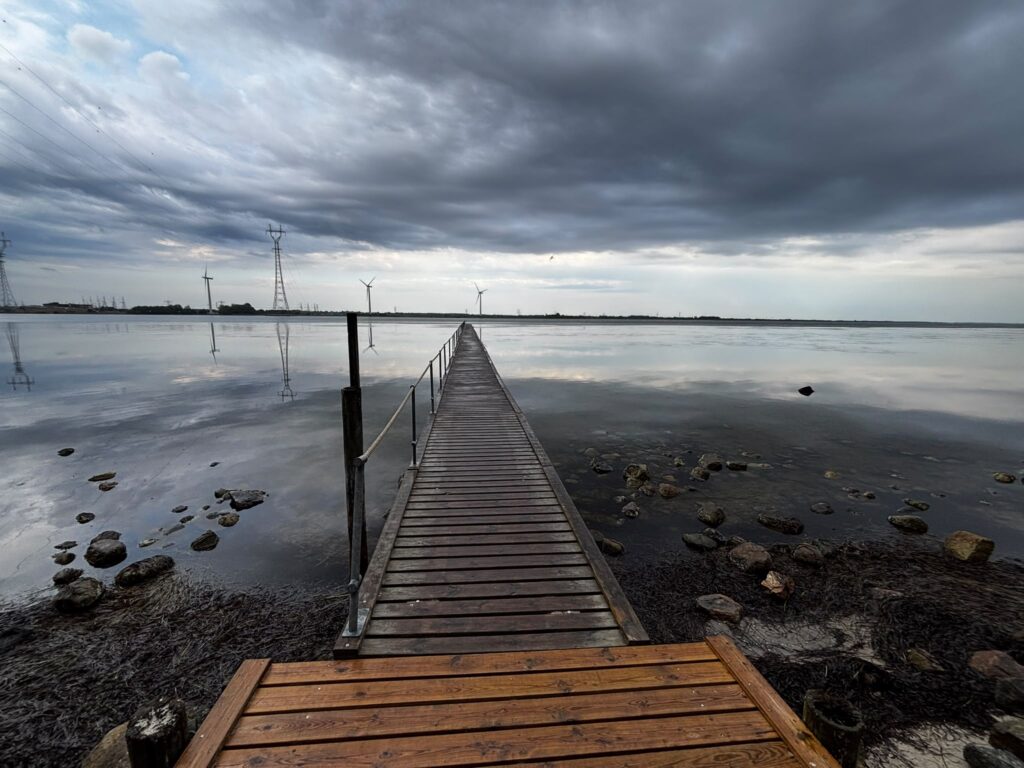 Wooden jetty stretching into the fjord at Hesteskoen in Aalborg