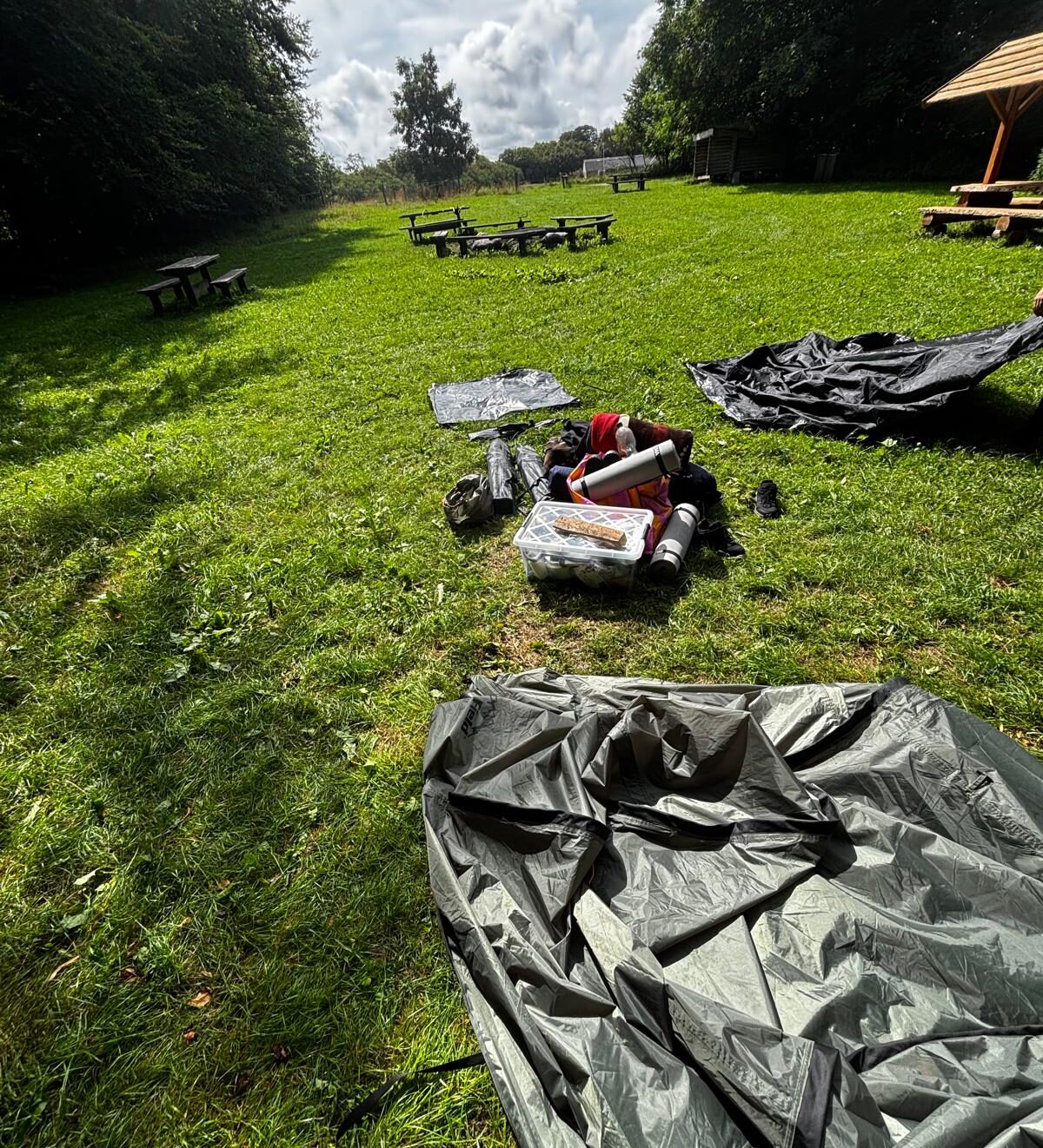 Setting up our tent on one of our first camping trips in Denmark